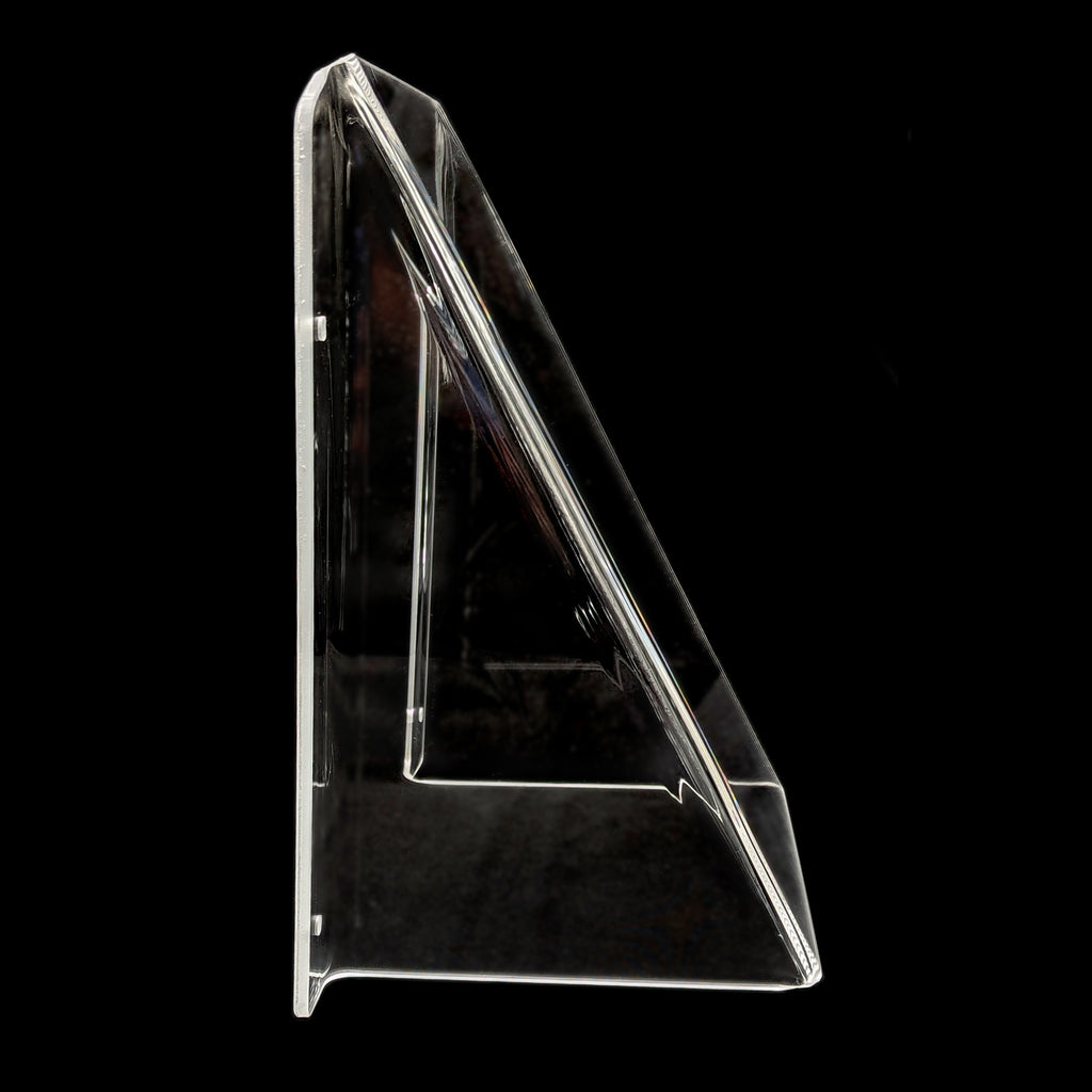 A clear acrylic pool tap cover shown from a side profile against a solid black background.