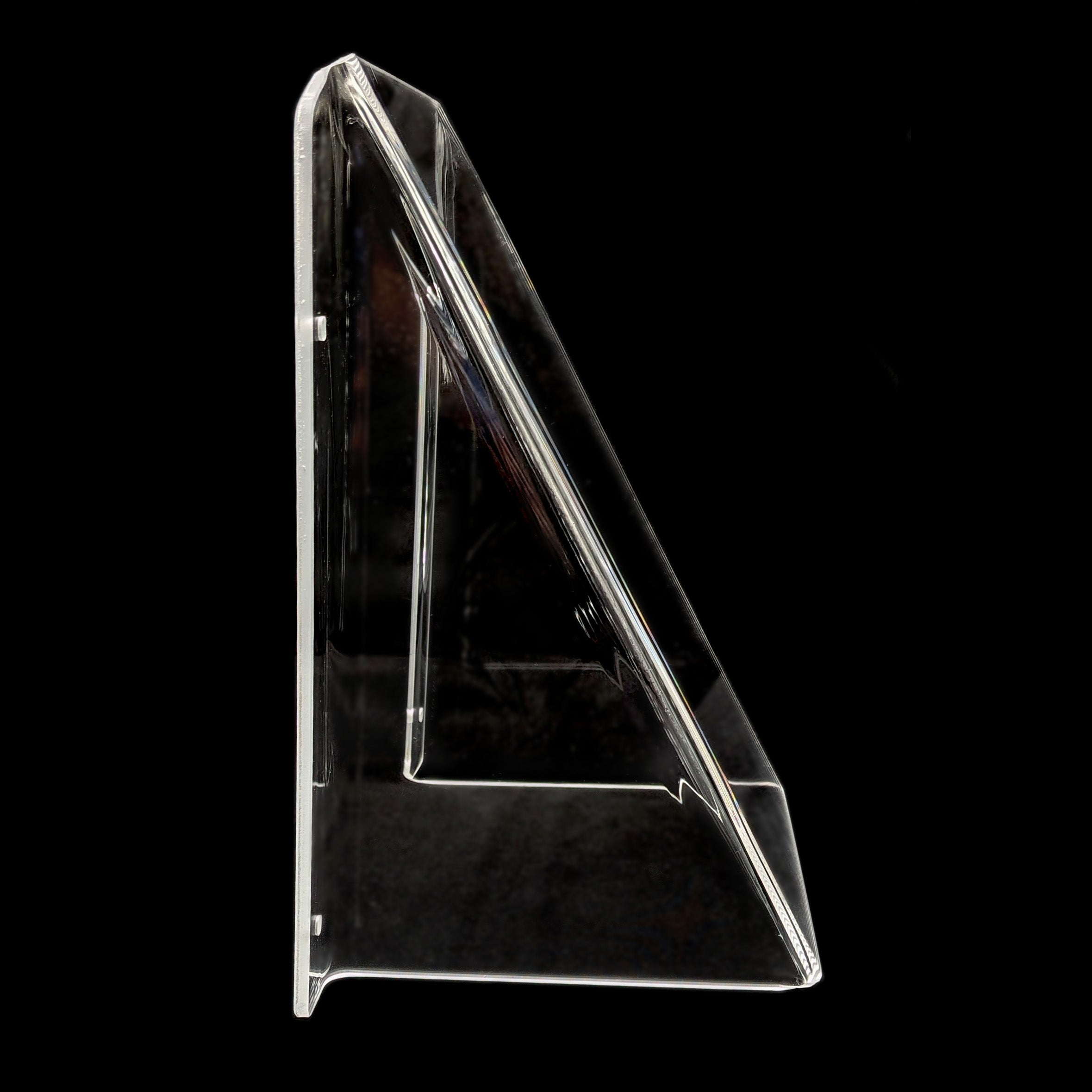 A clear acrylic pool tap cover shown from a side profile against a solid black background.