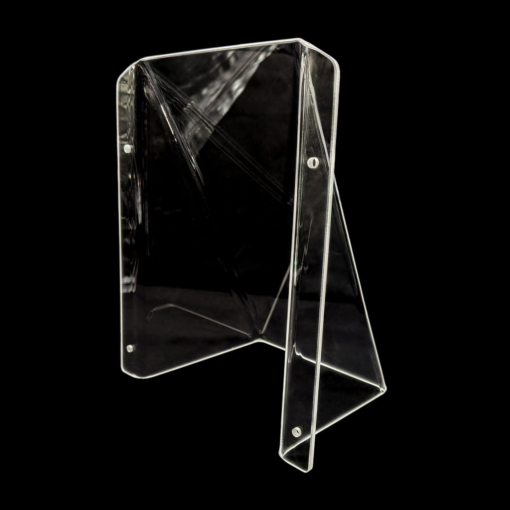 Clear acrylic pool tap cover with a triangular base and two vertical panels, shown on a solid black background.